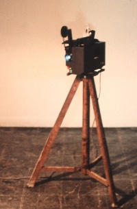 sculpture of iron and super 8 projector