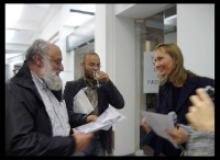Åsa handing out the flyer after the performance