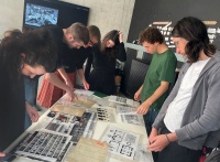 Åsa Lie with art students at LUCA Gent presenting the artist book Panagia Gorgoepikoos from 1993 by Åsa Lie & Jadran Sturm 