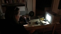 Merzedes checking old super 8 films in the archive
